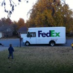 We were walking outside for an Adventure Walk (ie- me trying to keep them alive while walking in our neighborhood...) and the FedEx truck pulled up with the Full Core. That is Bug running to the truck- clearly the FedEx driver is more concerned than I was...